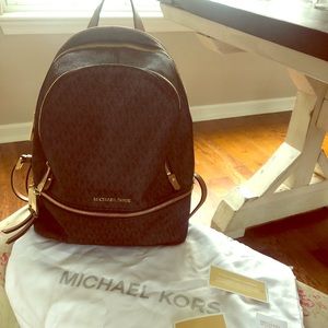 Michael Kors “Rhea Zip Medium Brown Backpack”